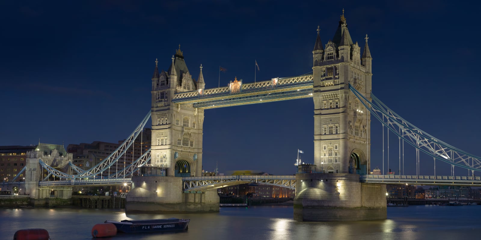Tower Bridge above the Thames in London at dusk